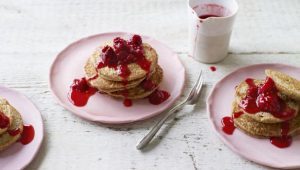 Oat pancakes with raspberries and honey