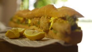Battered pollock baguettes with mushy peas and lemon mayonnaise