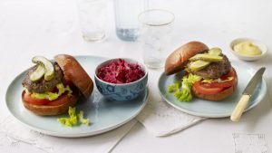 Beef burgers with beetroot and carrot slaw