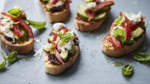 Bruschetta with avocado and olive tapenade