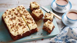 Carrot and sultana cake with creamy orange frosting