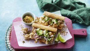 Fried chicken po'boy with salted cucumber and coconut sambal