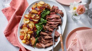 Thyme bavette steaks with potatoes and wilted spinach