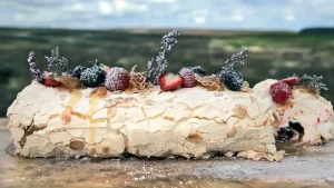 Summer berry and heather honey meringue roulade