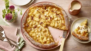 A delectable homemade apple pie baked to perfection, featuring a buttery, flaky crust and a warm, spiced apple filling. This Mary Berry recipe yields a classic apple pie that's sure to impress.