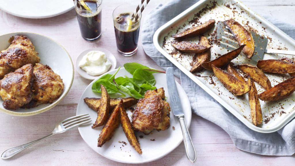 Crispy chicken with sweet potato fries and barbecue beans
